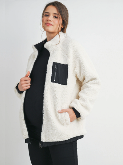 Veste polaire de grossesse bien chaude pour l'hiver de couleur blanc et noir avec une doublure