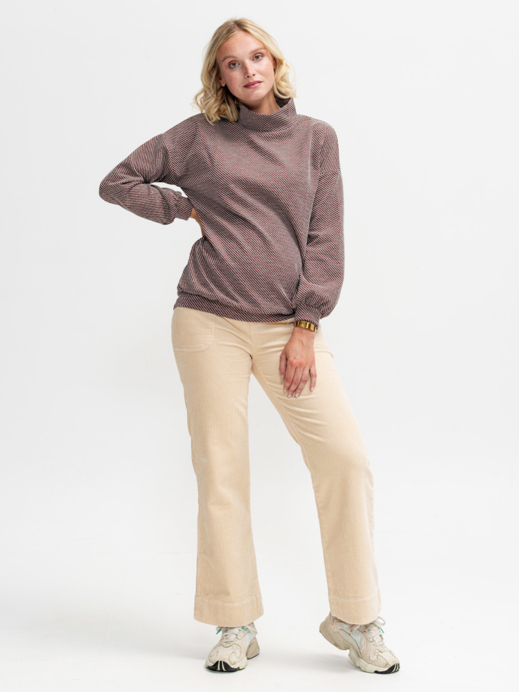 Red maternity sweater with gold sequins