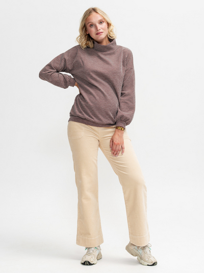 Red maternity sweater with gold sequins