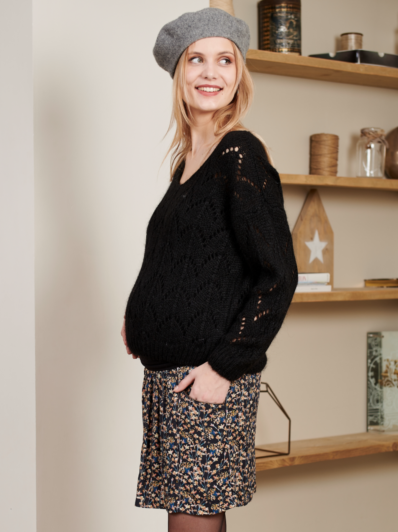 Black openwork knit maternity sweater